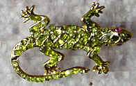 Swoboda peridot and garnet lizard