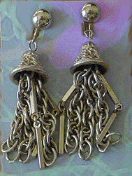 Exotic silver metal bell ear clips earrings