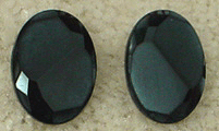 Black faceted glass oval clip earrings