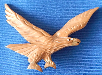 Carved wood eagle pin