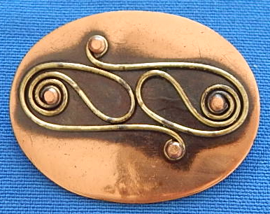 Chenel d Haiti copper pin