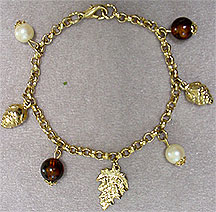Brown and gold charm bracelet